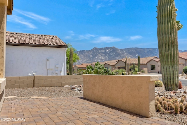 62742 E Oakwood Dr, Saddlebrooke, AZ 85739 - view of patio / terrace with a mountain view and a residential view