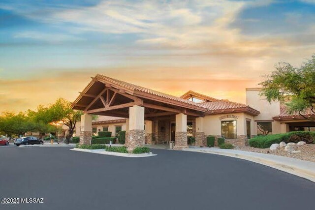62742 E Oakwood Dr, Saddlebrooke, AZ 85739 - view of property at dusk