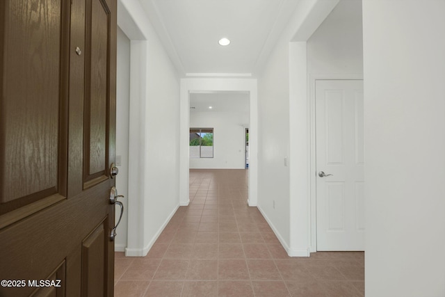 62742 E Oakwood Dr, Saddlebrooke, AZ 85739 - hall featuring light tile patterned flooring, baseboards, and recessed lighting