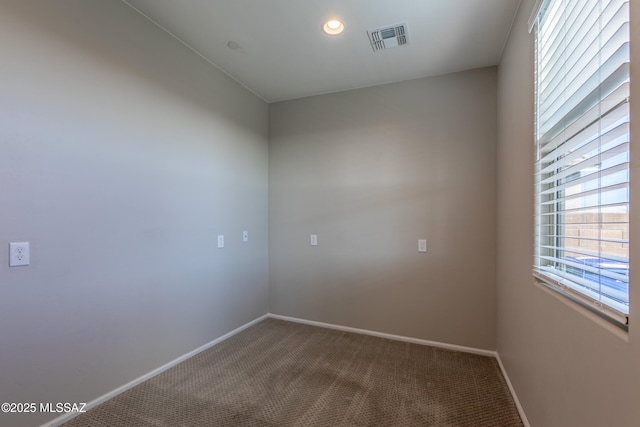 9734 E Miller Peak Trl, Tucson, AZ 85747 - unfurnished room with carpet floors, baseboards, and recessed lighting