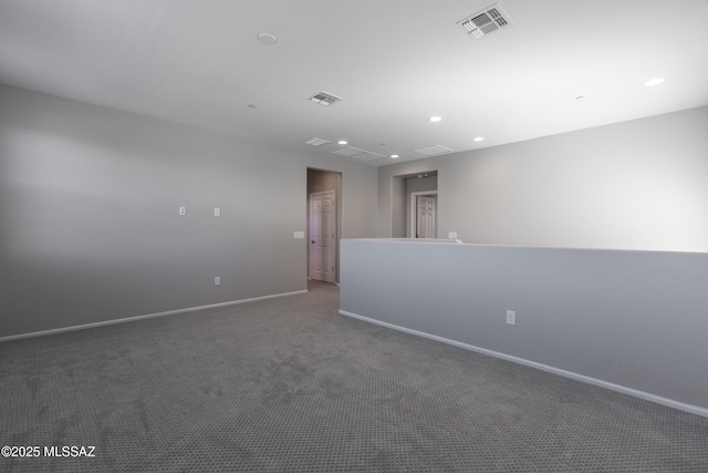 9734 E Miller Peak Trl, Tucson, AZ 85747 - unfurnished room featuring carpet, baseboards, and recessed lighting