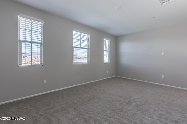 9734 E Miller Peak Trl, Tucson, AZ 85747 - empty room with carpet flooring and baseboards