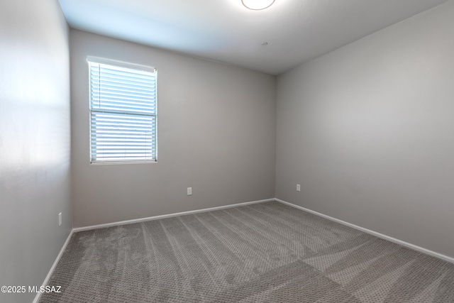 9734 E Miller Peak Trl, Tucson, AZ 85747 - carpeted empty room featuring baseboards