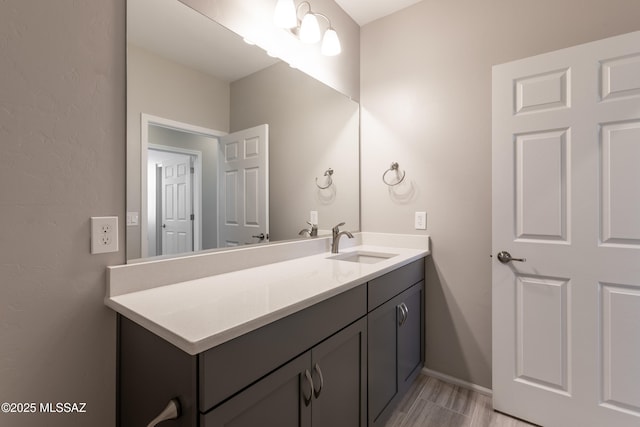 9734 E Miller Peak Trl, Tucson, AZ 85747 - bathroom with vanity and baseboards