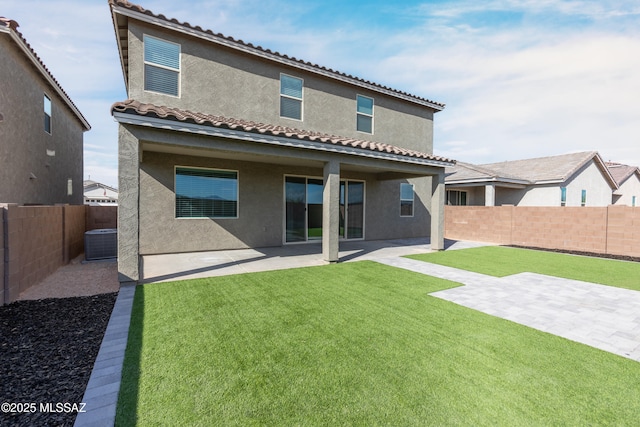 9734 E Miller Peak Trl, Tucson, AZ 85747 - back of property featuring stucco siding, a patio, central AC, and a tiled roof