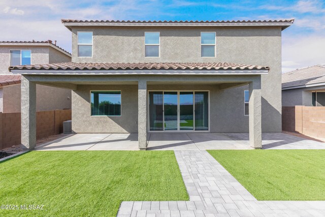 9734 E Miller Peak Trl, Tucson, AZ 85747 - rear view of house with a patio and stucco siding