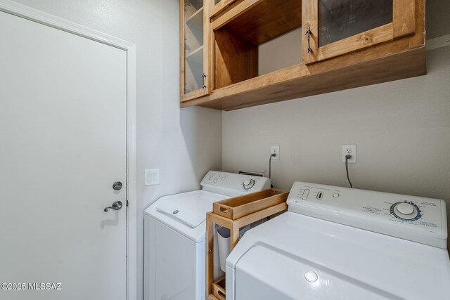 3526 E Farrier Dr, Tucson, AZ 85739 - clothes washing area with separate washer and dryer and cabinet space