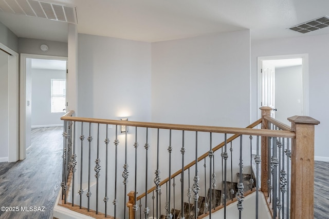 3526 E Farrier Dr, Tucson, AZ 85739 - hall with wood finished floors, an upstairs landing, and baseboards