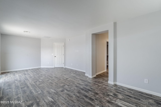 3526 E Farrier Dr, Tucson, AZ 85739 - unfurnished room featuring dark wood finished floors and baseboards