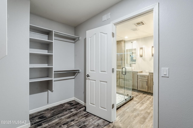 3526 E Farrier Dr, Tucson, AZ 85739 - walk in closet with wood finished floors
