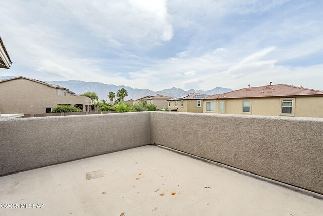 3526 E Farrier Dr, Tucson, AZ 85739 - view of front of home featuring fence, a mountain view, and stucco siding