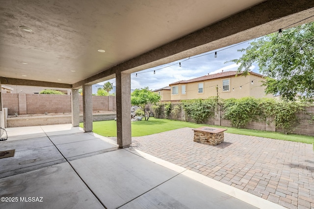 3526 E Farrier Dr, Tucson, AZ 85739 - view of patio / terrace featuring a fire pit