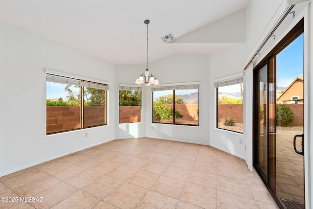 11874 N Verismo Dr, Tucson, AZ 85737 - unfurnished room featuring a chandelier, lofted ceiling, light tile patterned floors, and baseboards