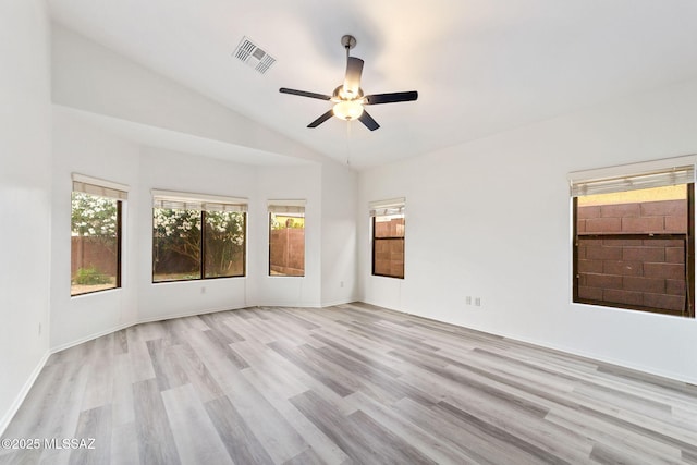 11874 N Verismo Dr, Tucson, AZ 85737 - unfurnished room featuring lofted ceiling, light wood-type flooring, ceiling fan, and baseboards