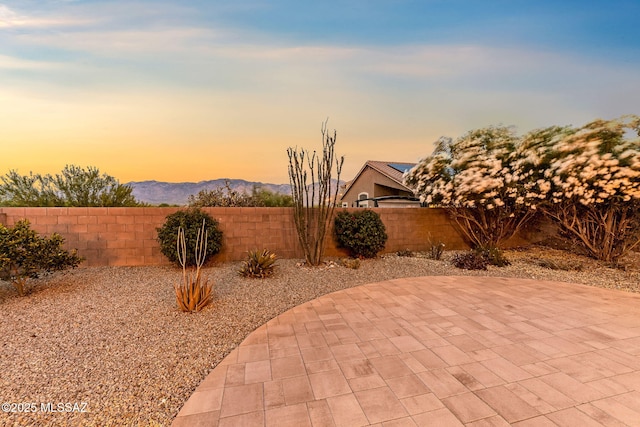 11874 N Verismo Dr, Tucson, AZ 85737 - patio terrace at dusk with a patio area and a mountain view