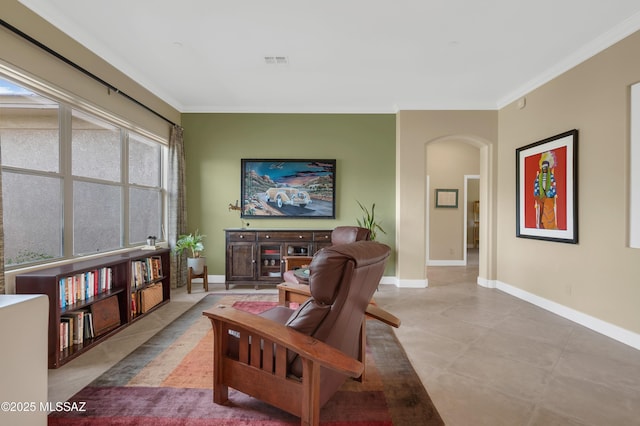 1808 W Quartz Rock Pl, Tucson, AZ 85737 - living area featuring arched walkways, crown molding, and baseboards