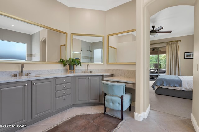 1808 W Quartz Rock Pl, Tucson, AZ 85737 - bathroom with ceiling fan, tile patterned floors, ensuite bathroom, double vanity, and ornamental molding