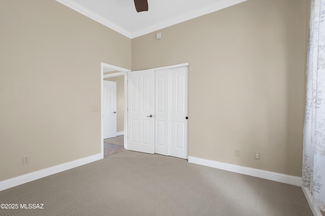 1808 W Quartz Rock Pl, Tucson, AZ 85737 - unfurnished bedroom with carpet, crown molding, baseboards, a closet, and a ceiling fan