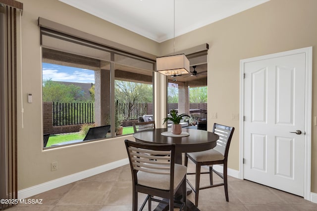 1808 W Quartz Rock Pl, Tucson, AZ 85737 - tiled dining area featuring ornamental molding, baseboards, and a chandelier