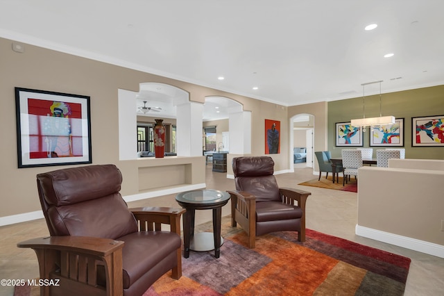1808 W Quartz Rock Pl, Tucson, AZ 85737 - living area featuring arched walkways, ornamental molding, recessed lighting, baseboards, and ceiling fan