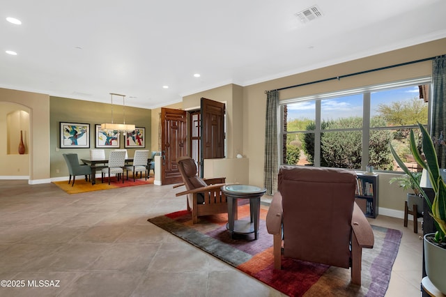 1808 W Quartz Rock Pl, Tucson, AZ 85737 - living room featuring arched walkways, recessed lighting, crown molding, baseboards, and light tile patterned floors