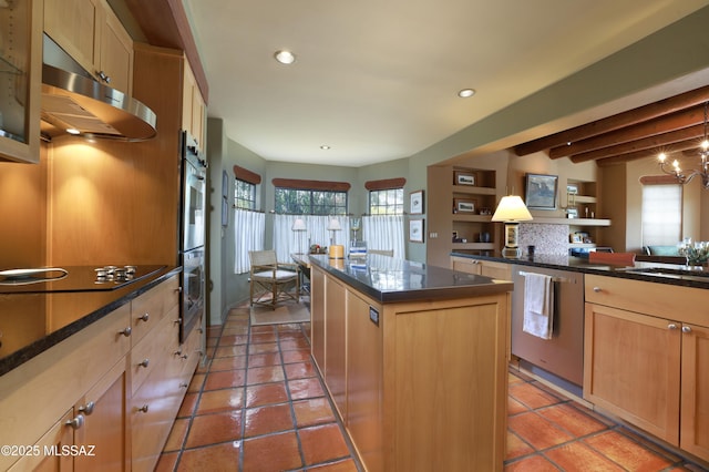 7020 N Chaparral Ave, Tucson, AZ 85718 - kitchen featuring stainless steel appliances, healthy amount of natural light, a center island, under cabinet range hood, and recessed lighting