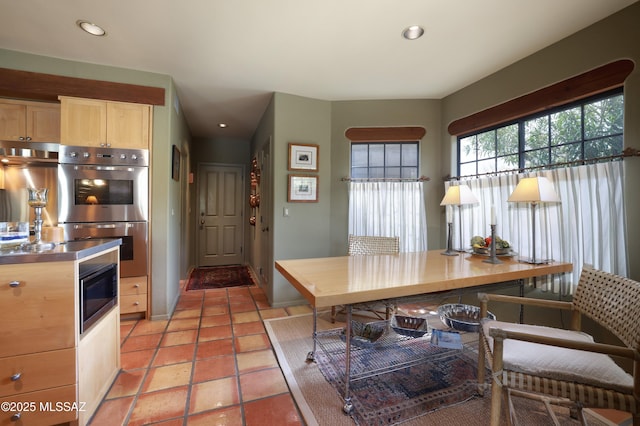 7020 N Chaparral Ave, Tucson, AZ 85718 - kitchen featuring stainless steel appliances, light brown cabinets, baseboards, and recessed lighting