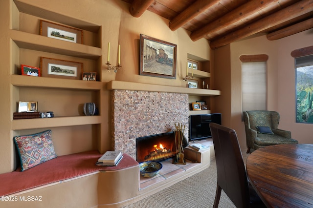 7020 N Chaparral Ave, Tucson, AZ 85718 - carpeted office featuring built in features, wood ceiling, beamed ceiling, and a stone fireplace