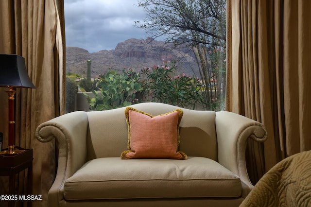 7020 N Chaparral Ave, Tucson, AZ 85718 - living area featuring a mountain view and plenty of natural light