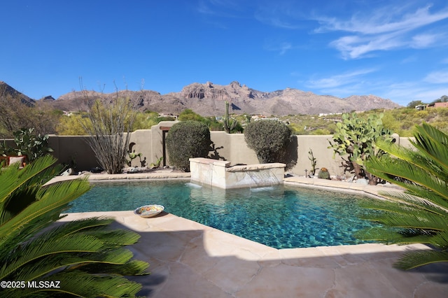 7020 N Chaparral Ave, Tucson, AZ 85718 - view of pool with a mountain view and a fenced backyard