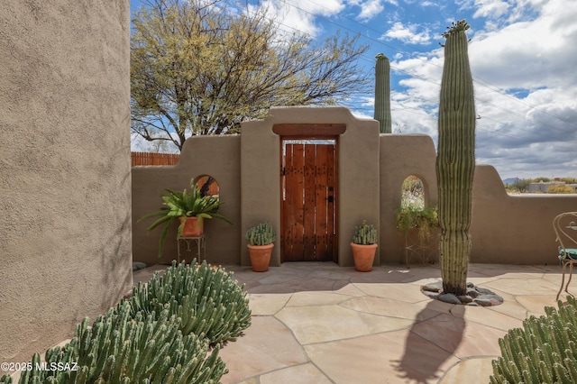 7020 N Chaparral Ave, Tucson, AZ 85718 - view of patio with fence and a gate