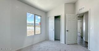 unfurnished bedroom featuring a closet and baseboards