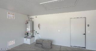 garage with gas water heater