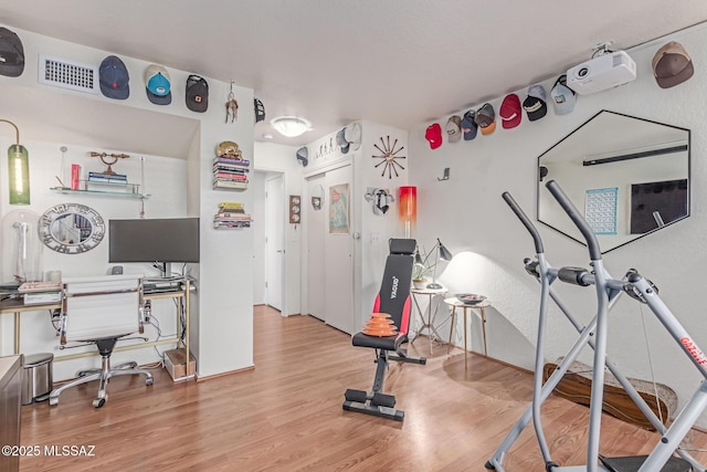 7622 E Callisto Cir Unit 204, Tucson, AZ 85715 - exercise area with wood finished floors