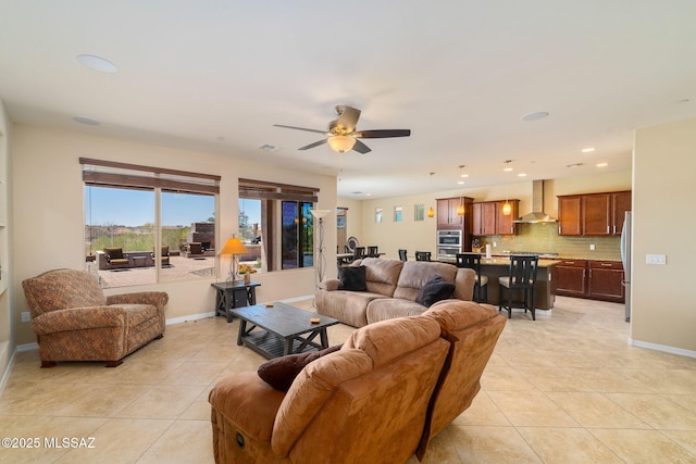 5950 S Hoptree Pl, Tucson, AZ 85747 - living area with light tile patterned flooring, a ceiling fan, recessed lighting, and baseboards