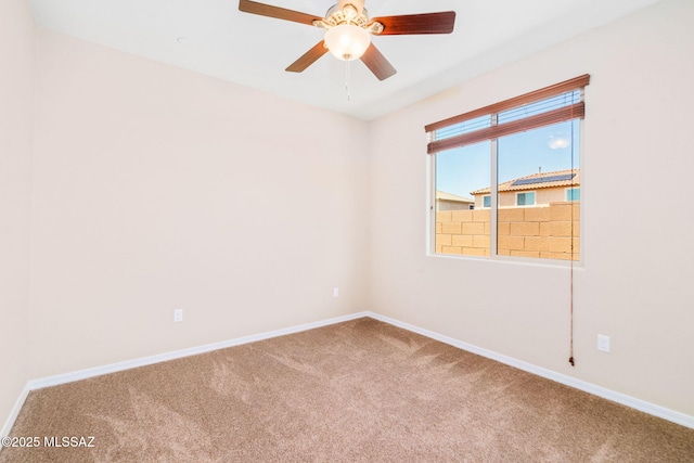 5950 S Hoptree Pl, Tucson, AZ 85747 - empty room featuring carpet flooring, baseboards, and ceiling fan