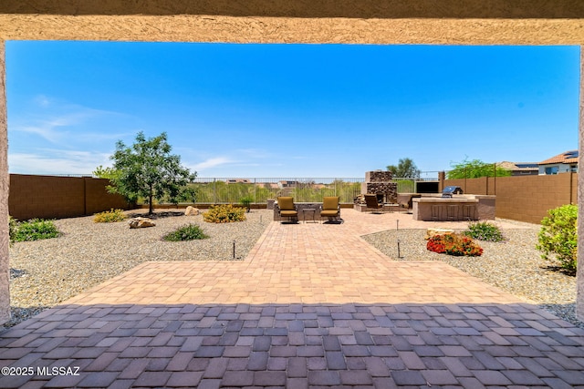 5950 S Hoptree Pl, Tucson, AZ 85747 - view of patio / terrace featuring a fenced backyard