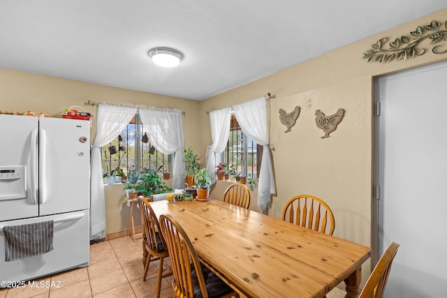 4760 W Tumacacori Dr, Amado, AZ 85645 - dining area featuring light tile patterned floors