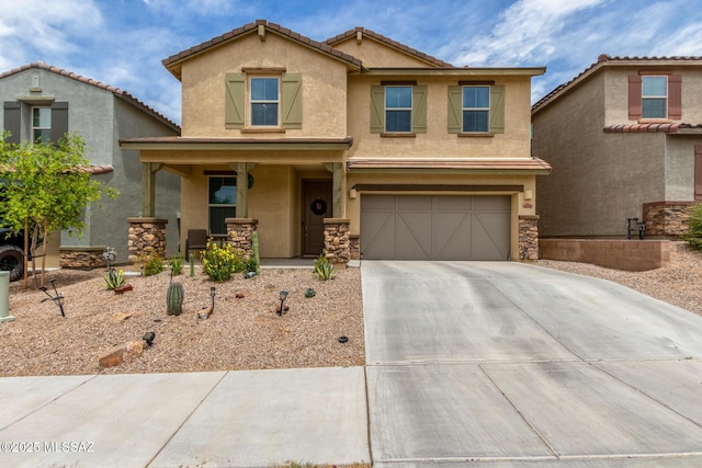 14247 E Axle Dr, Vail, AZ 85641 - traditional-style home featuring stucco siding, a porch, concrete driveway, an attached garage, and stone siding