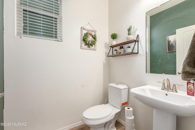14247 E Axle Dr, Vail, AZ 85641 - bathroom with a sink, toilet, and wood finished floors