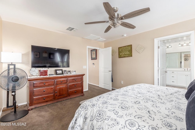 14247 E Axle Dr, Vail, AZ 85641 - bedroom with dark carpet, baseboards, ceiling fan, and ensuite bath