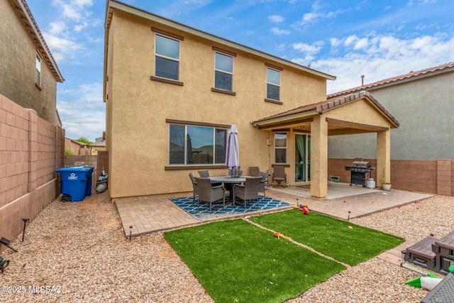 14247 E Axle Dr, Vail, AZ 85641 - rear view of property featuring stucco siding, a patio area, and a fenced backyard
