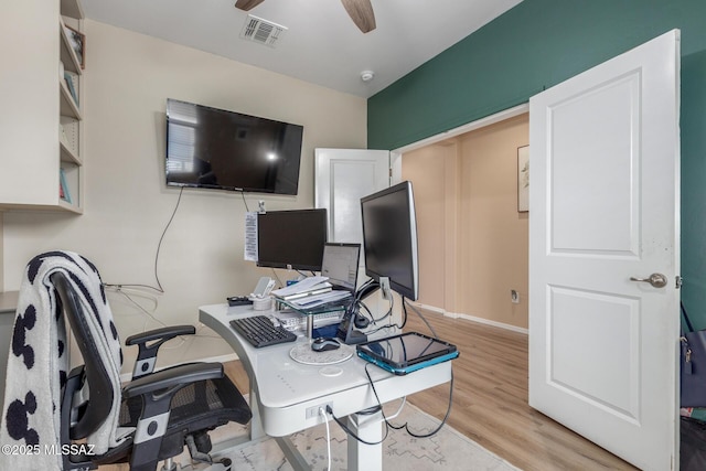 14247 E Axle Dr, Vail, AZ 85641 - office space featuring light wood-style flooring, ceiling fan, and baseboards