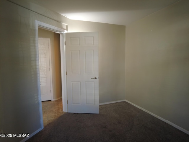 6700 S Stone Fly Dr, Tucson, AZ 85757 - carpeted empty room featuring baseboards