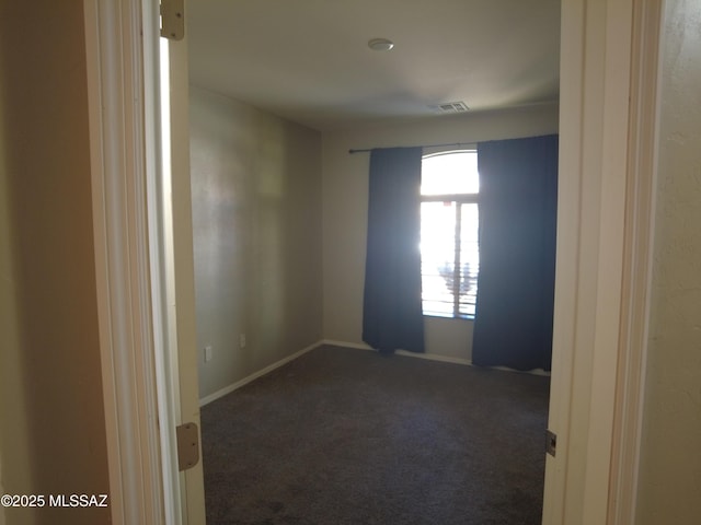 6700 S Stone Fly Dr, Tucson, AZ 85757 - empty room featuring carpet floors and baseboards