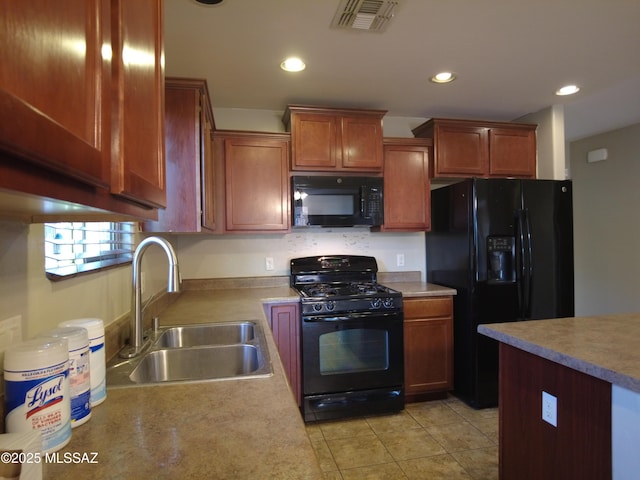 6700 S Stone Fly Dr, Tucson, AZ 85757 - kitchen with black appliances, a sink, recessed lighting, light countertops, and light tile patterned floors