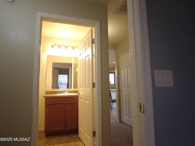 6700 S Stone Fly Dr, Tucson, AZ 85757 - hallway with a sink
