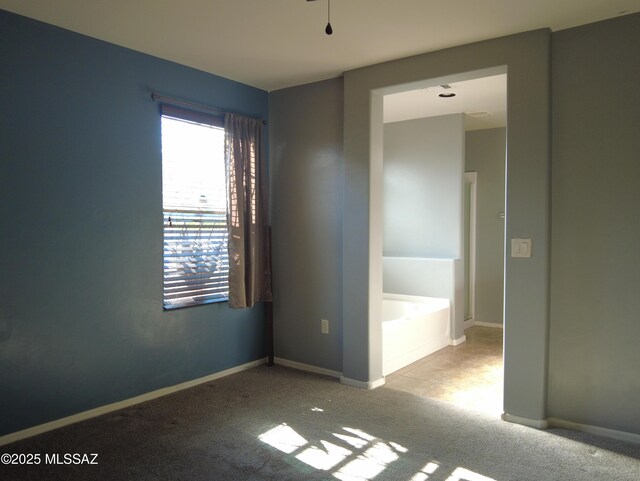 6700 S Stone Fly Dr, Tucson, AZ 85757 - spare room with carpet and baseboards