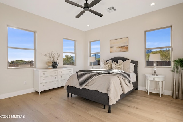 bedroom featuring light wood-style flooring, baseboards, recessed lighting, and ceiling fan