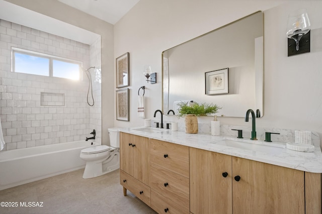 full bathroom with toilet, double vanity, washtub / shower combination, and tile patterned flooring